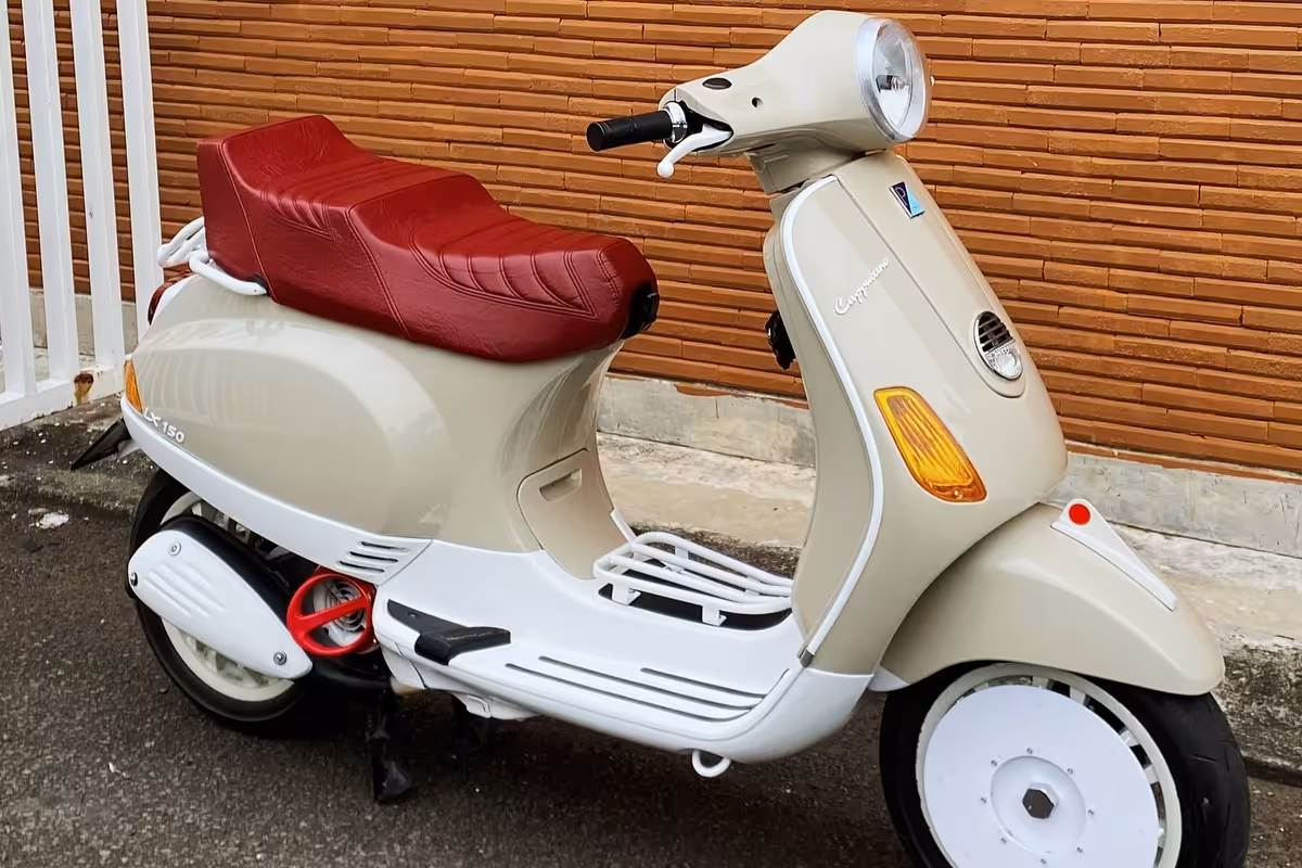 Custom Vespa seat with personalized monogram and owner's initials