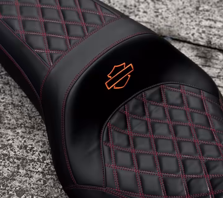 Close-up detail of hand-stitched custom Vespa seat pattern
